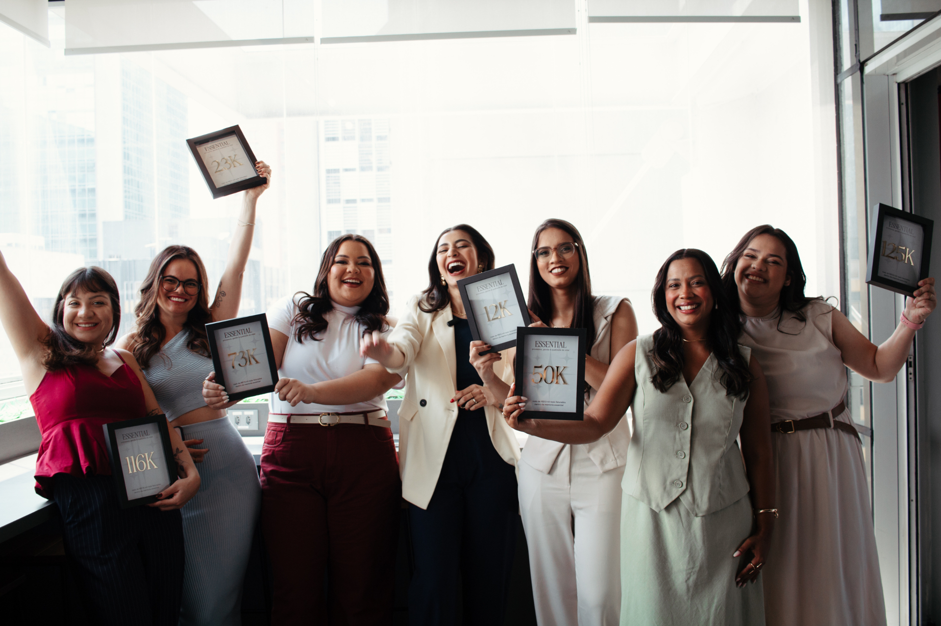 Empresárias comemorando resultados no Essence Day Experience